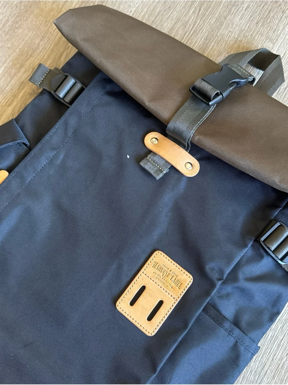 Black Roll-Top Backpack with Brown Leather Accents